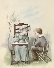 Girl reading to a boy